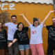 food provisions team at calais food collective smiling and standing together with their branded tshirts