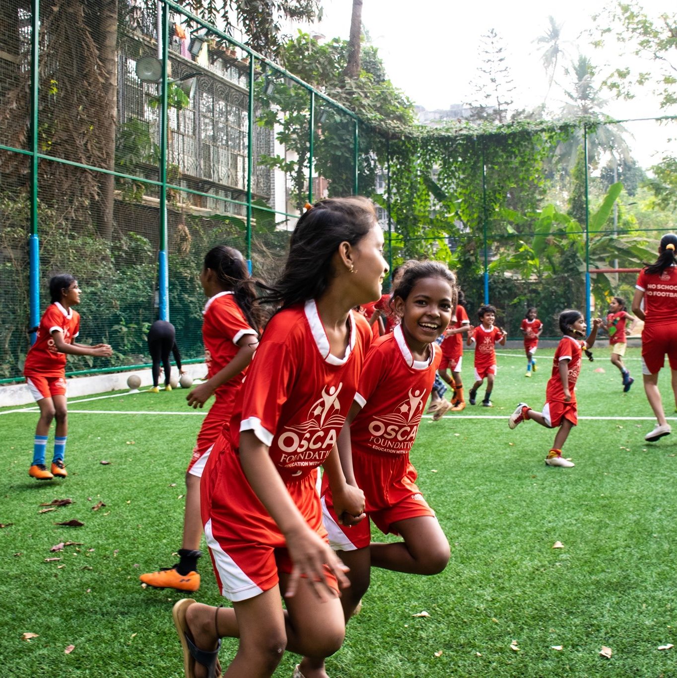 Social change young girls playing football