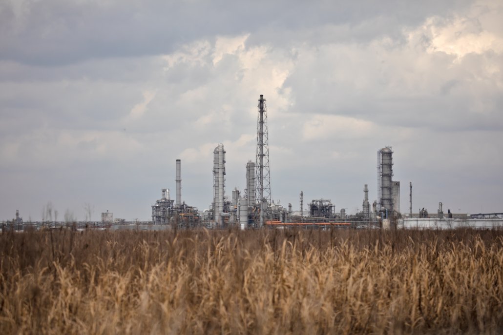 Industrial plants seen from the site where Formosa plans to build its petrochemical complex less than two miles from Sharon Lavigne's home in St. James, Louisiana.