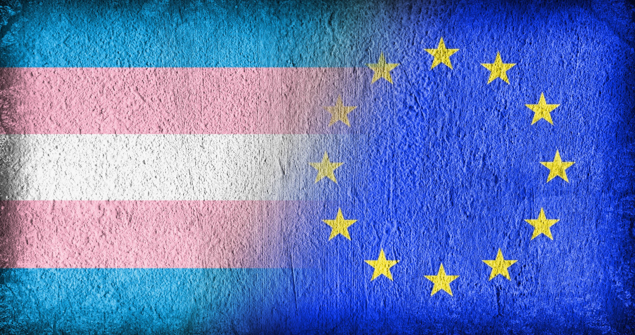 Trans Pride and the EU, flags painted on cracked concrete
